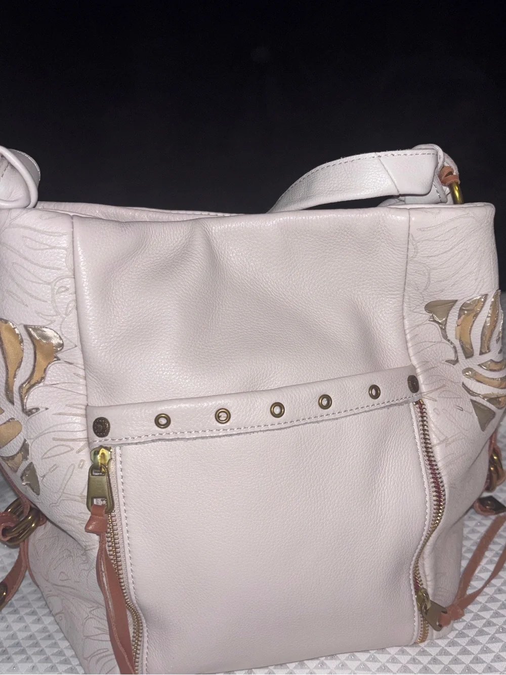 The Sak Cream Leather Shoulder Bag with Floral Cutout Accents